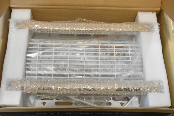2 brand new FTP30 W Insect Light Traps in box, with protective packaging. Visible labels indicate model and specs.