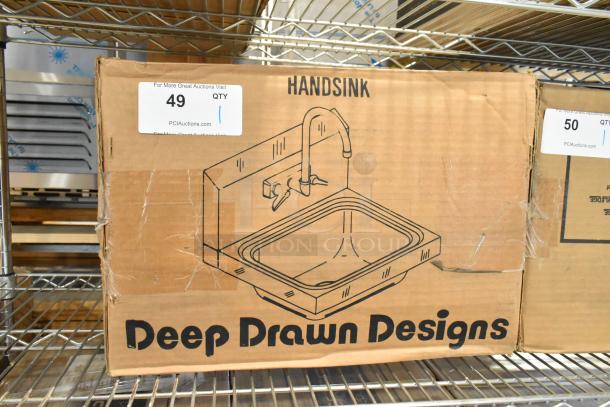 Alt text: Brand new Advance Tabco 7-PS-66 stainless steel wall mount sink in packaging, labeled "handsink," with minor box dents.