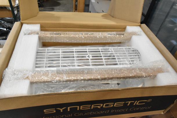 New FTP30 W Insect Light Trap in box with packaging, Synergetic branding, professional glueboard insect control.