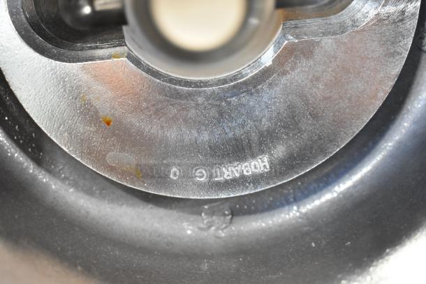 Metal mixer part marked "Hobart" with minor wear. Part of new scratch and dent lot including 190HCMTRUCK Bowl Truck and HL80FD Hook.