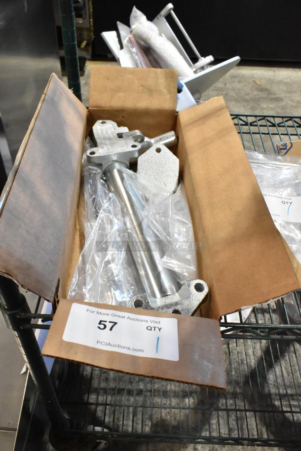 Brand new Kason 1097-000 door closure in box, scratch and dent condition, with mounting components visible.