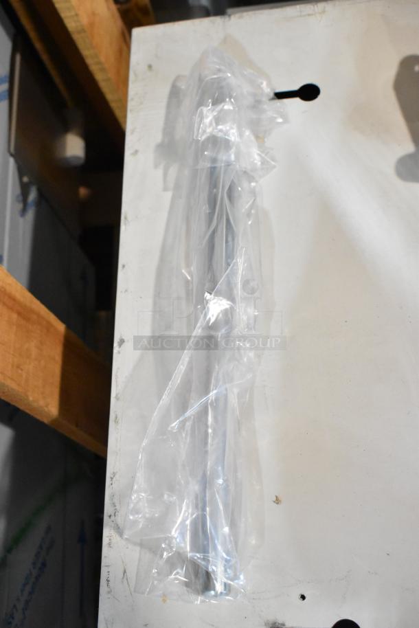 Brand new Kason 1097-000 door closure in packaging, minor scratches visible, unused condition.