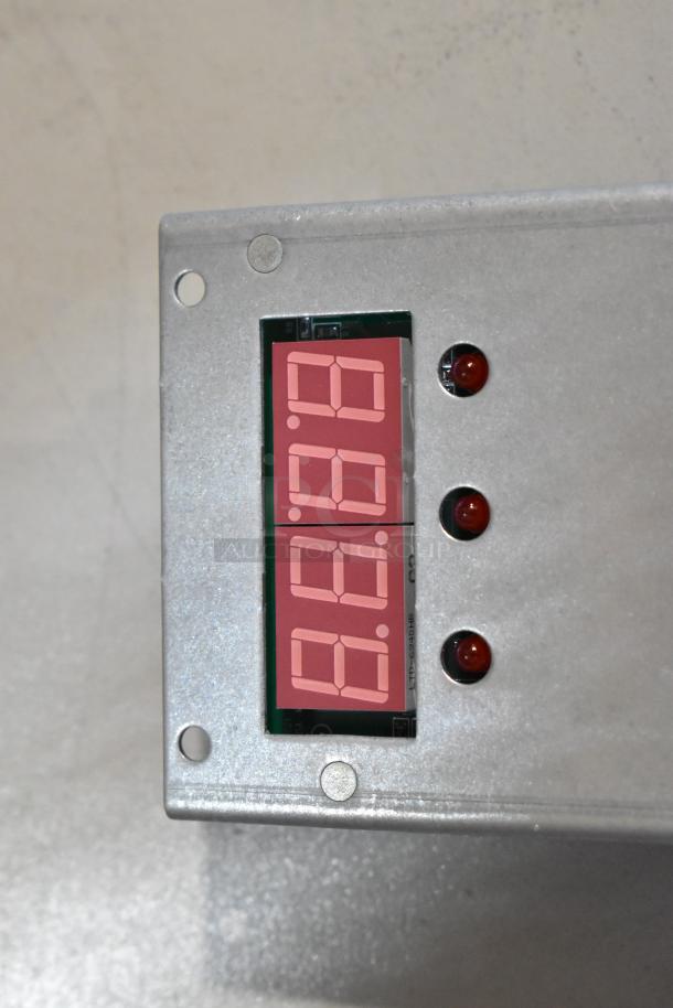 Brand new Blodgett HP58718 controller switch with slight scratches. Features digital display and three indicator lights.