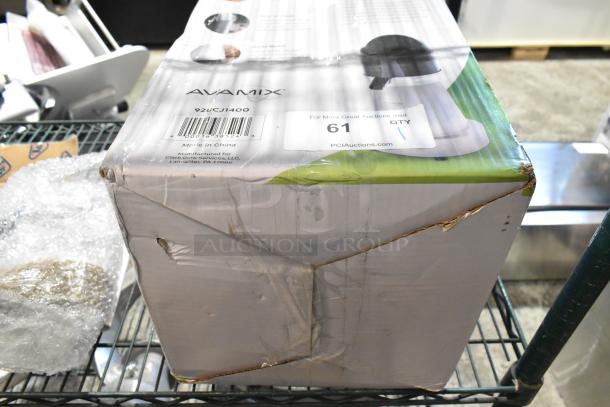 Brand new AvaMix 928CJ1400 citrus juicer in original damaged box. Stainless steel, electric, 120V, 1 phase, made in China.