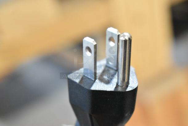 Close-up of a power plug for the AvaMix 928CJ1400 Stainless Steel Citrus Bar Juicer, 120 Volts, 1 Phase.
