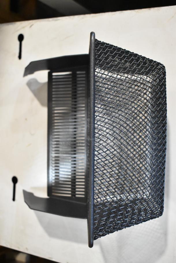 Black mesh unit with open design, brand new condition, part of scratch and dent auction, doubles bid value.