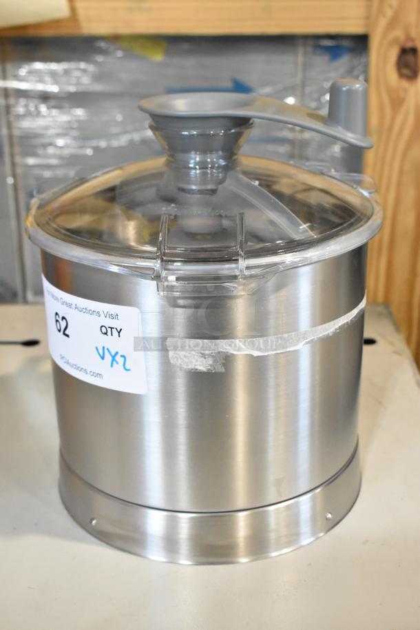 Brand new Robot Coupe 27338 stainless steel bowl assembly. Features a scratch and dent condition. Tag indicates auction lot number 62.