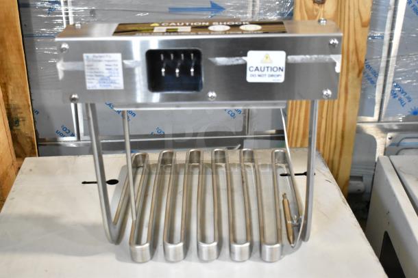 Brand new Perfect Fry 83339 heater assembly, 7.2 KW, 240V, 1PH. Features stainless steel coils and caution labels.