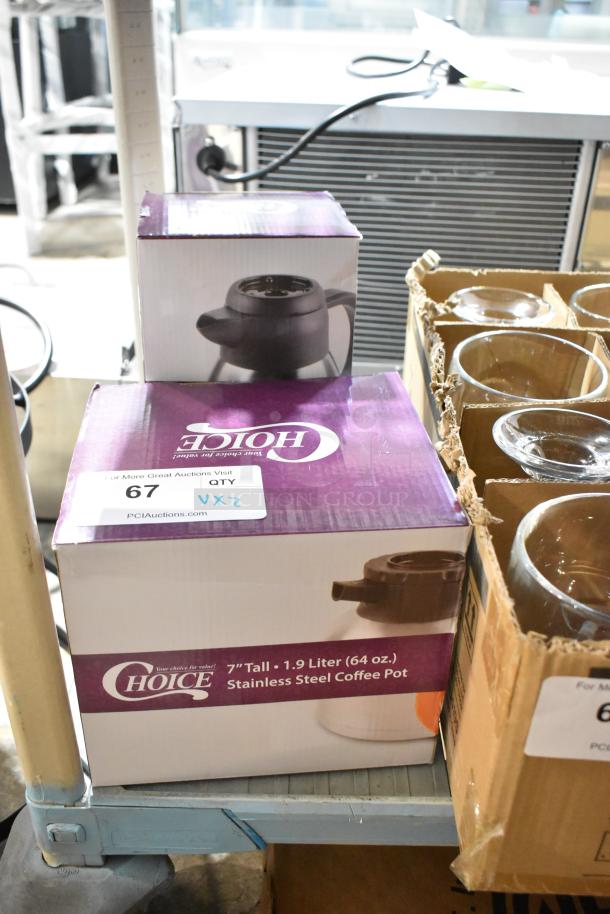 Two new Choice 64 oz. insulated thermal coffee carafes, boxed, with regular and decaf brew-thru lids. Box marked "7" tall."
