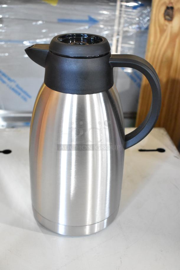 Brand new Choice 64 oz. insulated thermal coffee carafe, stainless steel, 7" x 6 3/8", with brew-thru lids.