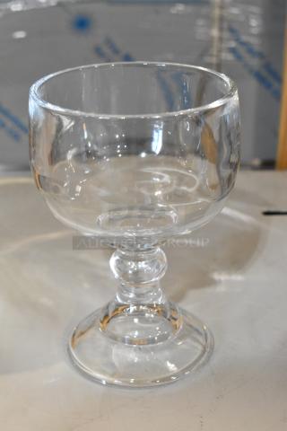 Box of 5535419S Acopa 21 oz. Schooner Glasses, 11/pack, brand new with scratch and dent, clear glass, 21 oz capacity.