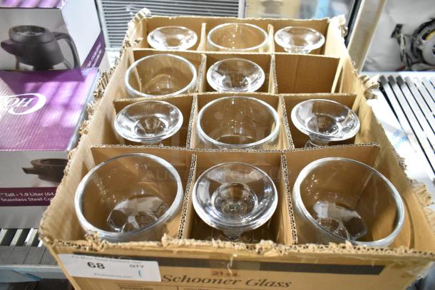 Box of Acopa 21 oz. Schooner Glasses, 11/Pack, brand new with minor box damage, clear glass, durable design.