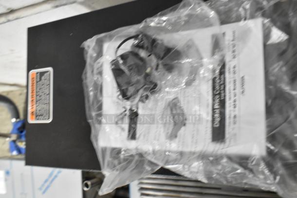 BRAND NEW AvaTek PCS15 15 lb. Digital Price Computing Scale, shown with packaging and instruction manual. Legal for Trade.