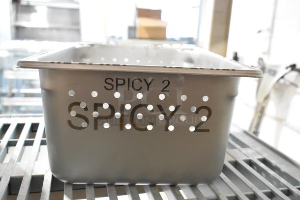 Brand new Lasertech 3LTM047 "Spicy 2" perforated food pan, 6" deep, engraved barcode, metal, scratch and dent condition.