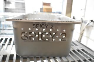 Brand new Lasertech 3LTM047 "Spicy 2" perforated food pan, 6" deep, engraved barcode, metal, scratch and dent condition.