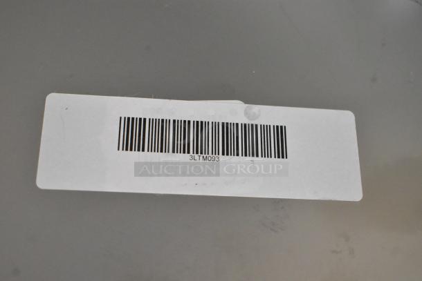 Barcode label on Lasertech Metal Works 3LTM047 "Spicy 2" perforated food pan. Model: 3193LTM093. Item: scratch and dent.