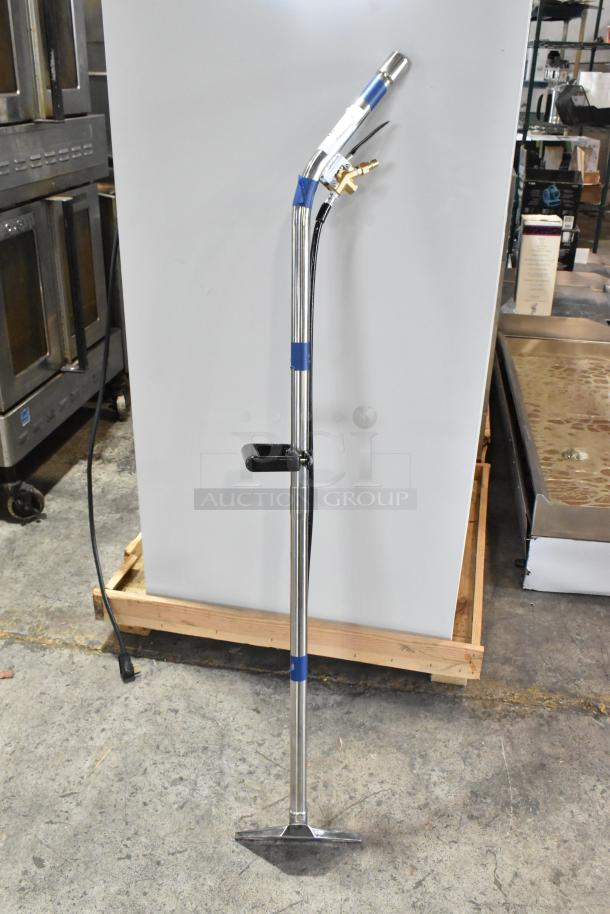 Brand new cleaning machine attachment, chrome finish, scratch and dent condition, with brass fittings and ergonomic handle.