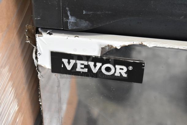 Vevor SKF-E150F ice machine, visible wear, 110V, 1 phase, metal undercounter design, Vevor label displayed.
