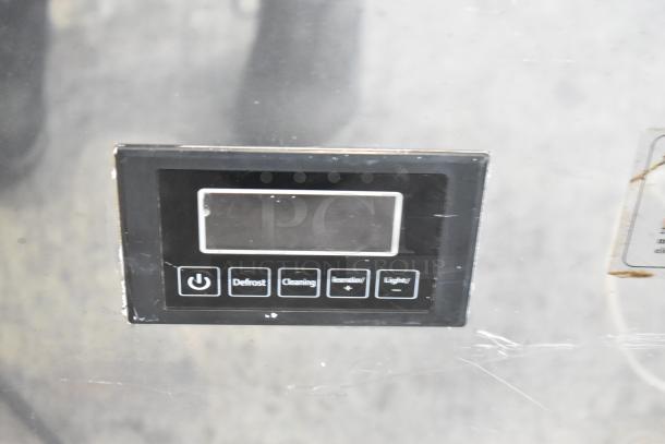 Vevor SKF-E150F undercounter ice machine control panel with buttons for power, defrost, and cleaning.