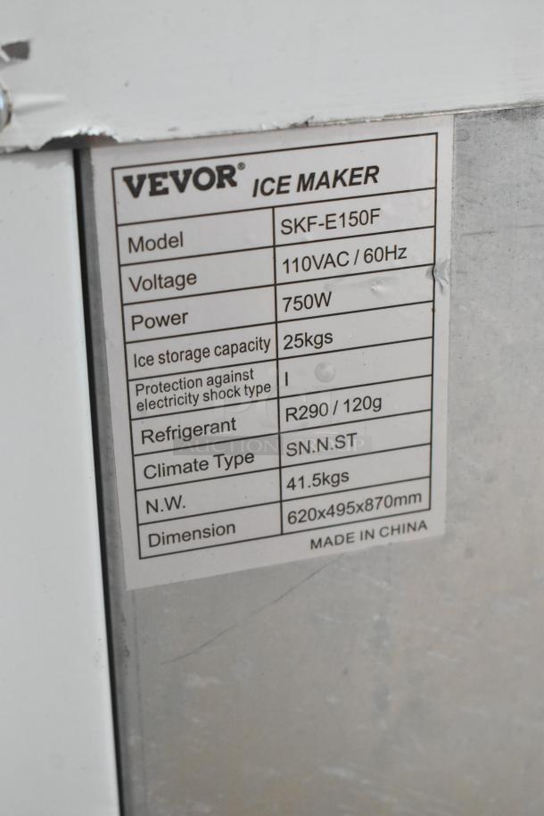Vevor SKF-E150F Metal Commercial Ice Machine label showing 110V, 750W, 25kg capacity, dimensions 620x495x870mm. Made in China.