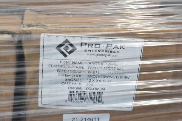 20 boxes of Pro-Pak white paper handle bags, size 12x9x15.75 in. Origin: Colombia. Model: AnotherWing12915W. Case pack: 200.