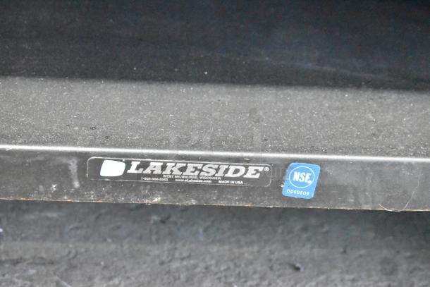 Lakeside metal bakery display rack with casters, NSF certified, black finish, made in USA, label visible.