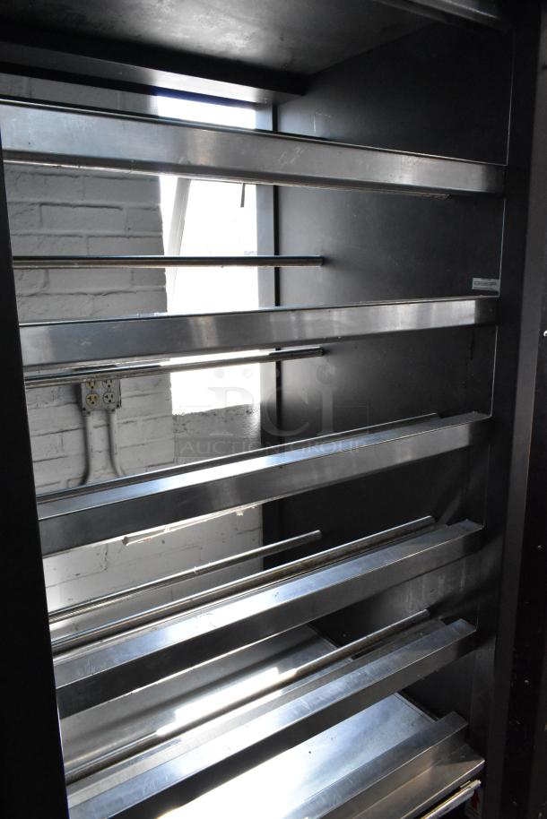 Lakeside metal commercial display rack for bakery items, on casters, sturdy metal shelving, ideal for pastries and bagels.