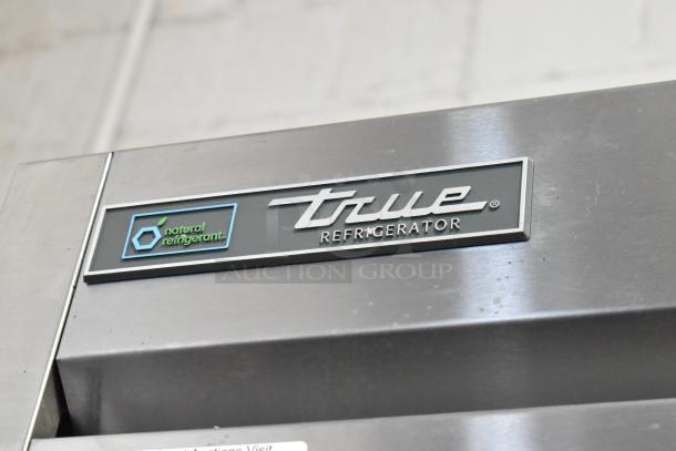 2019 True T-35-HC stainless steel 2-door reach-in cooler with poly coated racks, 115V, features natural refrigerant logo.