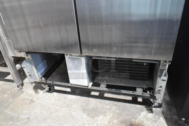 2019 True T-35-HC stainless steel 2-door reach-in cooler with poly-coated racks, 115V, 1 phase, minor exterior wear.