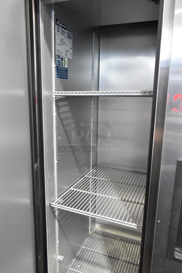2019 True T-35-HC stainless steel commercial cooler; 2-door, poly-coated racks, model tag visible, 115V, 1 phase.