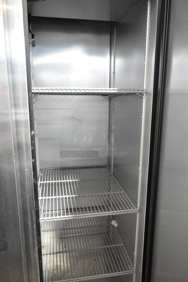 2019 True T-35-HC stainless steel commercial cooler with two doors, poly-coated racks. 115 volts, 1 phase, clean interior.