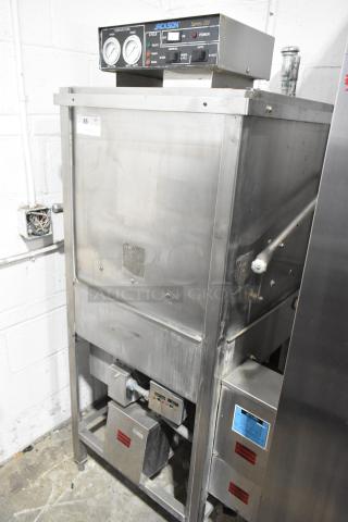 Jackson 150B stainless steel commercial dishwasher, pass-through model, 208/220V, 3 phase, visible control panel, good condition.