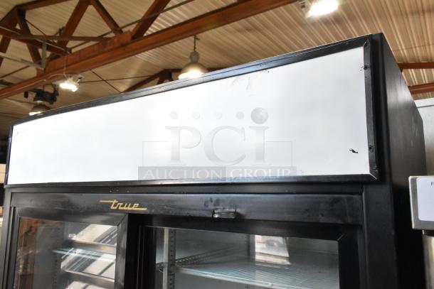 True Metal Commercial 2-Door Cooler with poly-coated racks, 115 volts, 1 phase. Features glass doors and True branding.