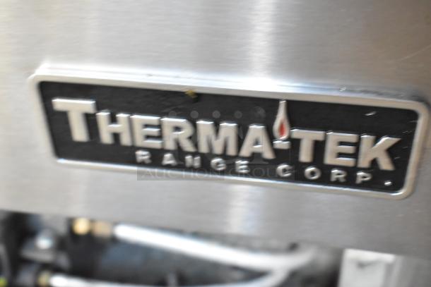 2018 Therma-Tek TMD48-8-2N stainless steel badge detail, featuring brand logo on commercial gas range.