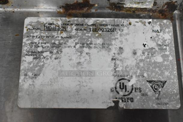 Label on 2018 Therma-Tek TMD48-8-2N stainless steel range. Shows model number, UL certification, and worn text.
