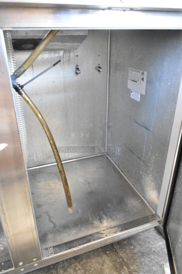 Beverage Air DD58HC-1-S stainless steel kegerator interior, visible piping, commercial casters, 115V, well-maintained.