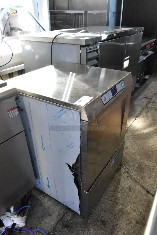 2019 Hobart LXEH stainless steel commercial undercounter dishwasher, 120/208-240 volts, 1 phase, visible side dent and label.
