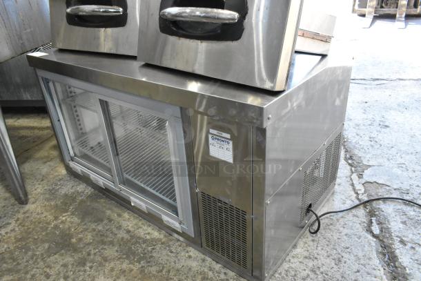 Randell 40048A stainless steel refrigerated display case; see-thru doors; 115V; commercial use; model label visible.