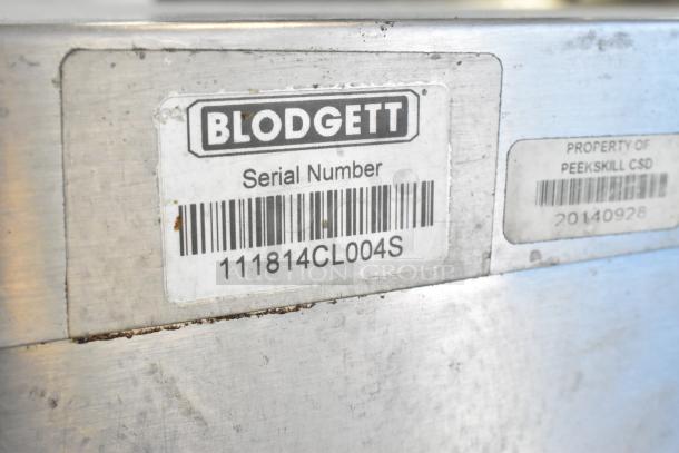 Blodgett convection oven label with serial number 111814CL004S, indicating ownership by Peekskill CSD.