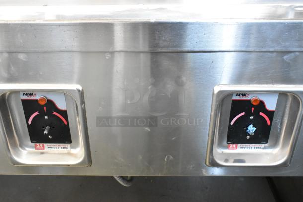 APW Wyott TM-90D stainless steel steam table controls, showing temperature dials and brand labels. Excellent condition.