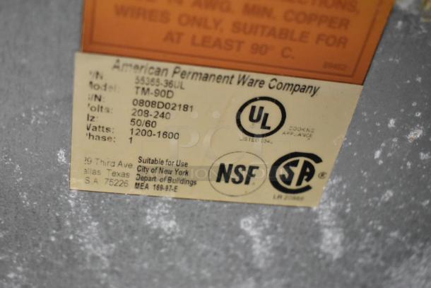 APW Wyott TM-90D label showing volt range 208-240, wattage 1200-1600, NSF, UL, and CSA certifications.