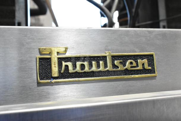 Traulsen logo on stainless steel commercial refrigerator model RDT332NUT-HHS, showcasing durable build and brand quality.