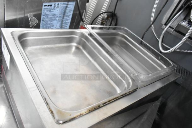 Winco FW-S500 stainless steel food warmer, dual wells, 120 volts, 1 phase, slight wear, visible label.