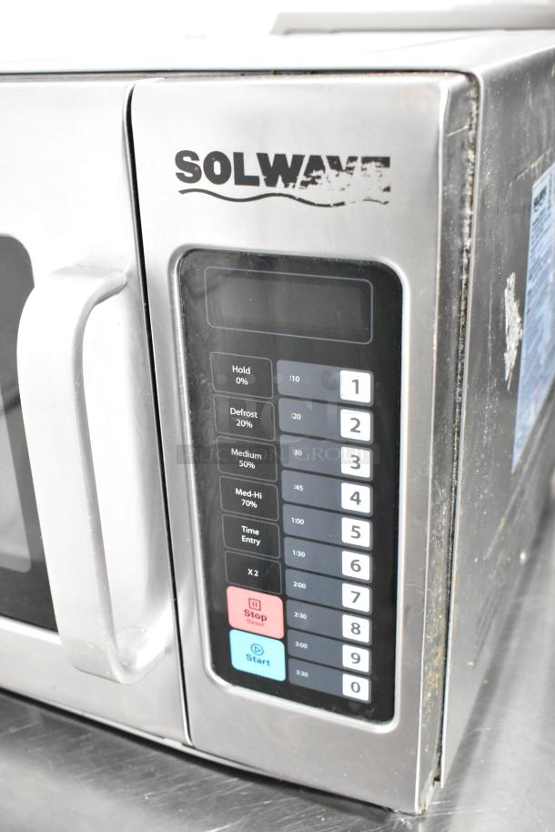 2018 Solwave 180MW1200T stainless steel commercial countertop microwave oven, 120 volts, 1 phase, visible control panel wear.