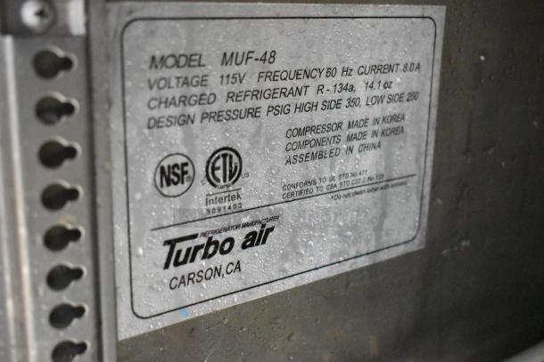 Turbo Air MUF-48 stainless steel commercial freezer label, showing model, voltage, and refrigerant details.