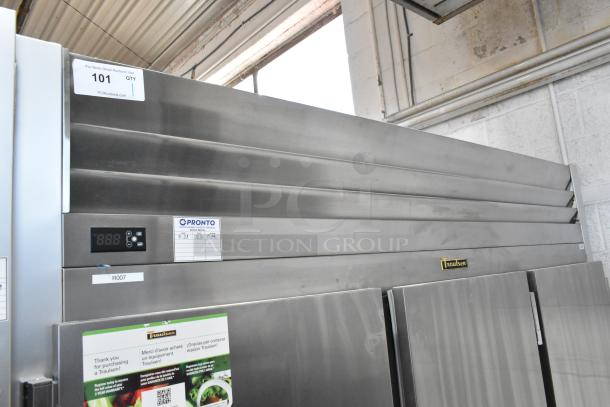 2018 Traulsen G30010 stainless steel 3-door reach-in cooler with poly-coated racks and commercial casters. Model G30010.