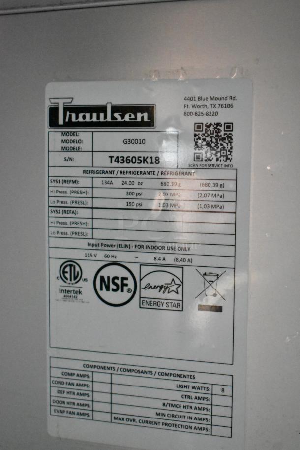 2018 Traulsen G30010 commercial cooler label showing model and serial number, energy specifications, and certifications.