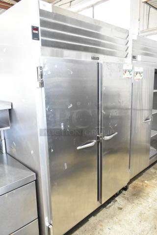 2016 Traulsen G20010 stainless steel 2-door cooler with poly coated racks, commercial casters, left door locked, 115V.