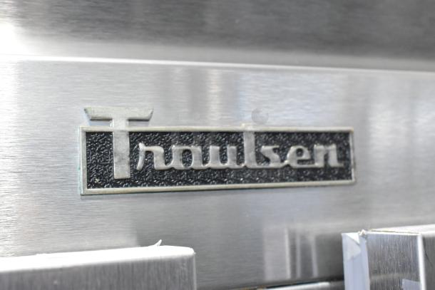 2016 Traulsen G20010 stainless steel 2-door commercial cooler, poly-coated racks, commercial casters, left door locked.