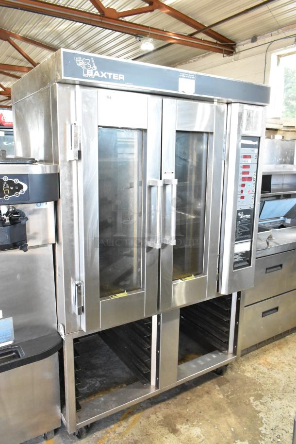 Baxter stainless steel gas-powered mini rotating rack oven on double pan rack with commercial casters; excellent condition.